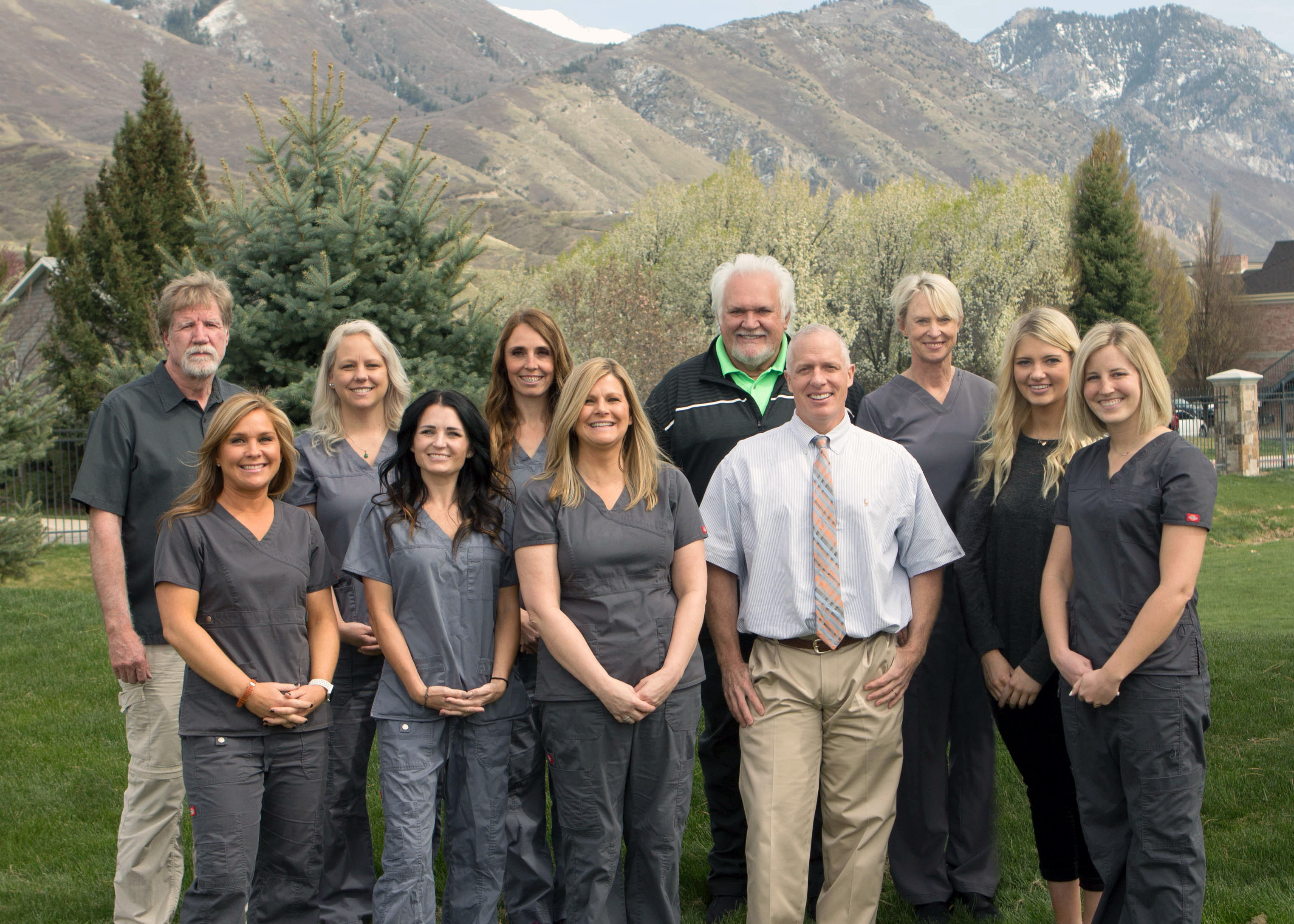 Dr. Will Christensen and his team of 11 men and women outside in Orem, Utah